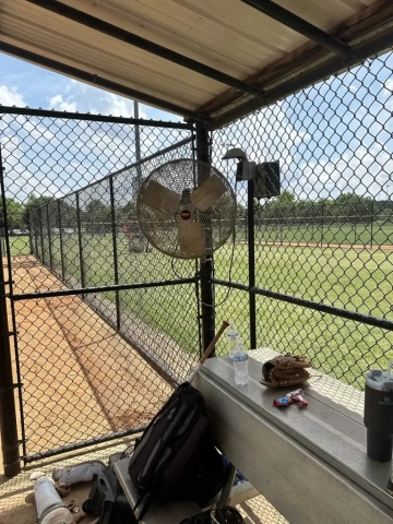 Dugout with fan at Tyger River Softball Park